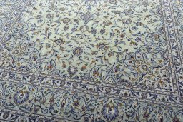Close-up detail of 2000s Kashan rug from Iran / Persia showing Wool weave