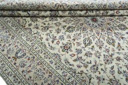 Close-up detail of 2000s Kashan rug from Iran / Persia showing Wool weave