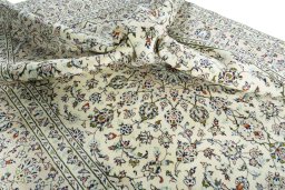 Surface texture of 2000s Kashan rug with natural Wool and intricate pattern