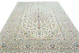Surface texture of 2000s Kashan rug with natural Wool and intricate pattern