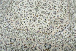 Close-up detail of 2000s Kashan rug from Iran / Persia showing Wool weave