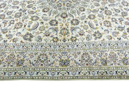 Corner detail of 1970s Kashan rug showing border pattern and Wool pile