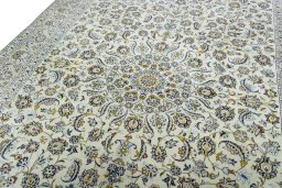 Backside of handmade 1970s Kashan rug showing knot structure and weave density