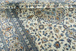 Close-up detail of 2000s Kashan rug from Iran / Persia showing Wool weave