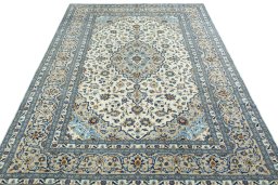 Surface texture of 2000s Kashan rug with natural Wool and intricate pattern