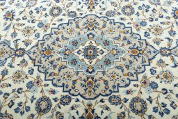 Central medallion detail of 2000s Kashan rug from Iran / Persia