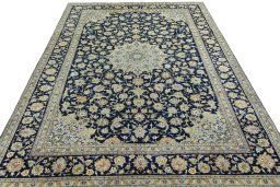 Surface texture of 2000s Kashan rug with natural Wool and intricate pattern