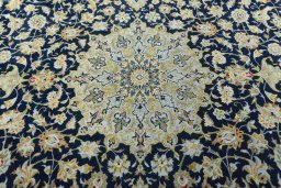 Central medallion detail of 2000s Kashan rug from Iran / Persia