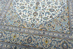 Close-up detail of 2000s Kashan rug from Iran / Persia showing Wool weave