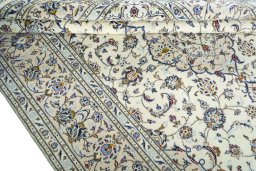 Close-up detail of 2000s Kashan rug from Iran / Persia showing Wool weave