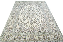Surface texture of 2000s Kashan rug with natural Wool and intricate pattern