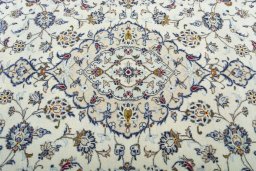 Central medallion detail of 2000s Kashan rug from Iran / Persia