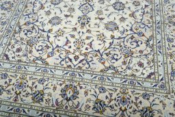 Close-up detail of 2000s Kashan rug from Iran / Persia showing Wool weave