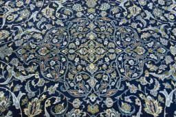 Central medallion detail of 2000s Kashan rug from Iran / Persia
