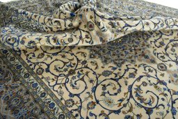 Surface texture of 2000s Kashan rug with natural Wool and intricate pattern