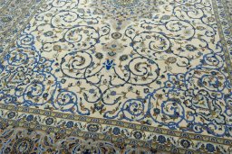 Close-up detail of 2000s Kashan rug from Iran / Persia showing Wool weave
