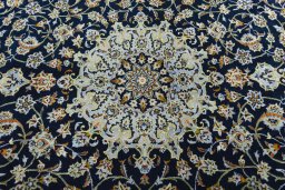 Central medallion detail of 2000s Kashan rug from Iran / Persia