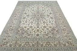 Surface texture of 2000s Kashan rug with natural Wool and intricate pattern