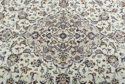 Central medallion detail of 2000s Kashan rug from Iran / Persia