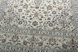 Close-up detail of 2000s Kashan rug from Iran / Persia showing Wool weave
