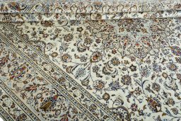 Close-up detail of 2000s Kashan rug from Iran / Persia showing Wool weave