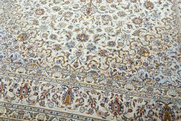 Close-up detail of 2000s Kashan rug from Iran / Persia showing Wool weave