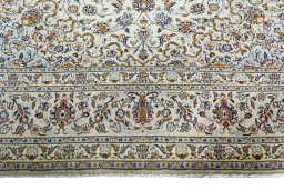 Full view of 2000s Kashan rug from Iran / Persia, 400 × 293 cm in Beige tones