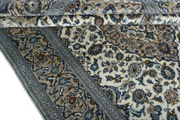 Close-up detail of 2000s Kashan rug from Iran / Persia showing Wool weave