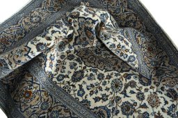 Surface texture of 2000s Kashan rug with natural Wool and intricate pattern