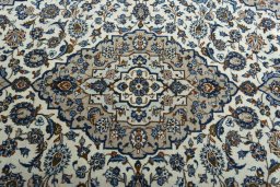 Central medallion detail of 2000s Kashan rug from Iran / Persia