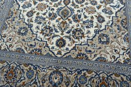 Close-up detail of 2000s Kashan rug from Iran / Persia showing Wool weave