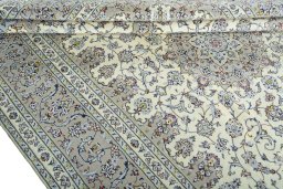 Close-up detail of 2000s Kashan rug from Iran / Persia showing Wool weave
