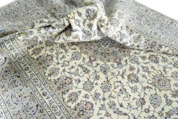 Surface texture of 2000s Kashan rug with natural Wool and intricate pattern