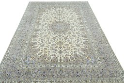 Surface texture of 2000s Kashan rug with natural Wool and intricate pattern