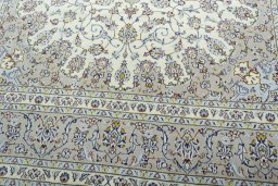Close-up detail of 2000s Kashan rug from Iran / Persia showing Wool weave