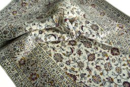 Surface texture of 2000s Kashan rug with natural Wool and intricate pattern