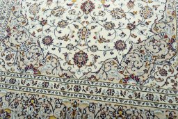 Close-up detail of 2000s Kashan rug from Iran / Persia showing Wool weave