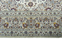 Full view of 2000s Kashan rug from Iran / Persia, 294 × 197 cm in Beige tones