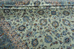 Close-up detail of 2000s Kashan rug from Iran / Persia showing Wool weave