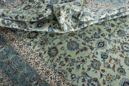 Surface texture of 2000s Kashan rug with natural Wool and intricate pattern