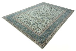 Corner detail of 2000s Kashan rug showing border pattern and Wool pile
