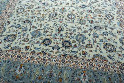Close-up detail of 2000s Kashan rug from Iran / Persia showing Wool weave