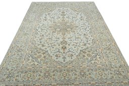 Surface texture of 2000s Kashan rug with natural Wool and intricate pattern