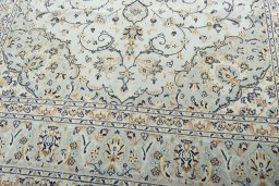 Close-up detail of 2000s Kashan rug from Iran / Persia showing Wool weave
