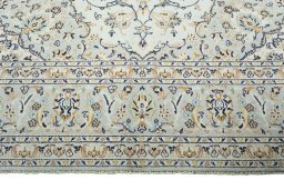 Full view of 2000s Kashan rug from Iran / Persia, 356 × 248 cm in Beige tones