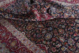 Surface texture of 2000s Kashan rug with natural Wool and intricate pattern
