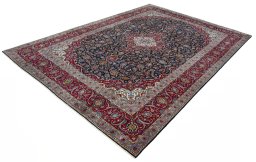 Corner detail of 2000s Kashan rug showing border pattern and Wool pile