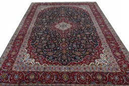 Surface texture of 2000s Kashan rug with natural Wool and intricate pattern
