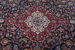 Central medallion detail of 2000s Kashan rug from Iran / Persia