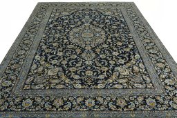 Surface texture of 2000s Kashan rug with natural Wool and intricate pattern